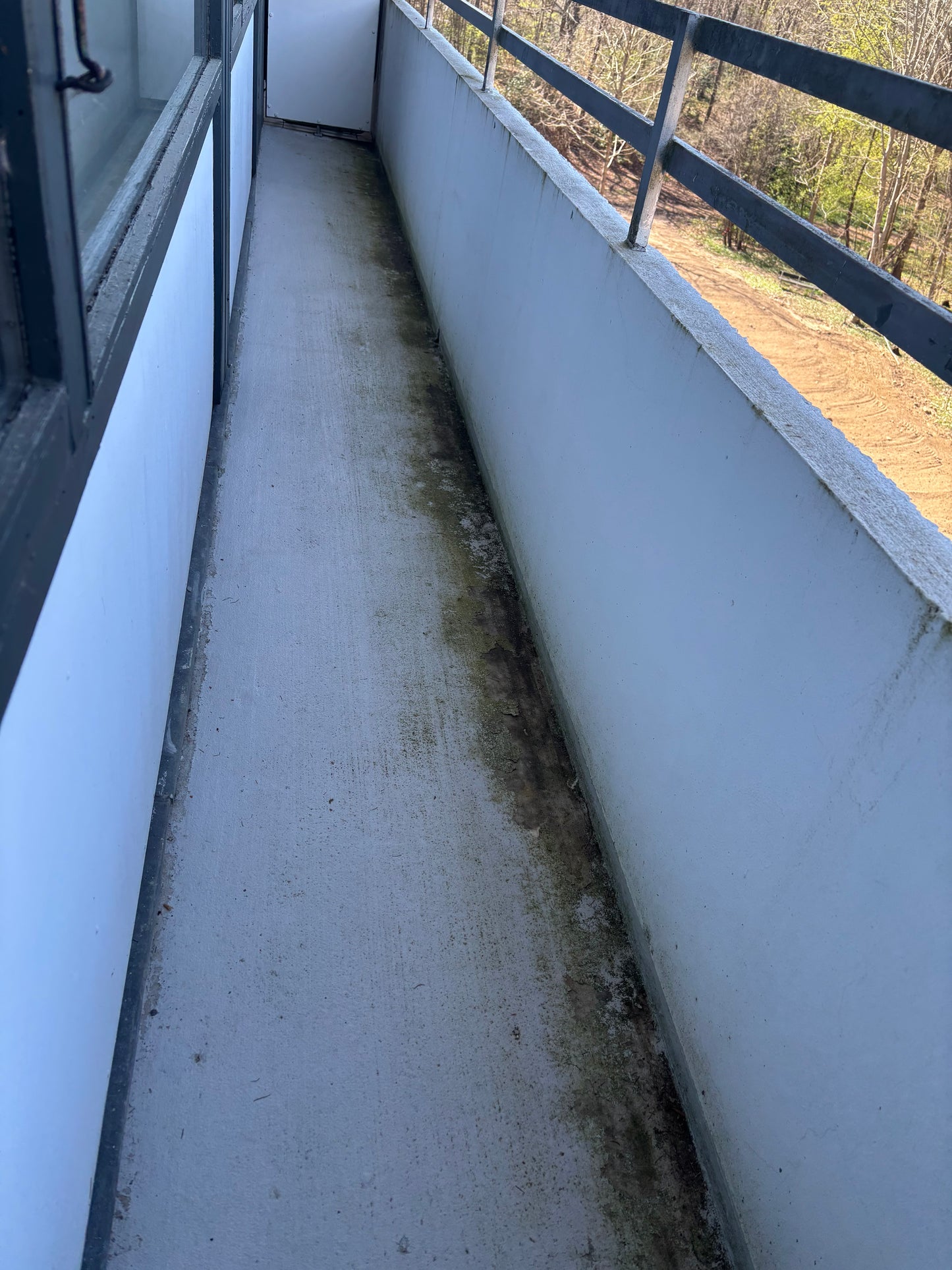 Dirty balcony in need of professional cleaning service in Copenhagen for a pristine outdoor space.